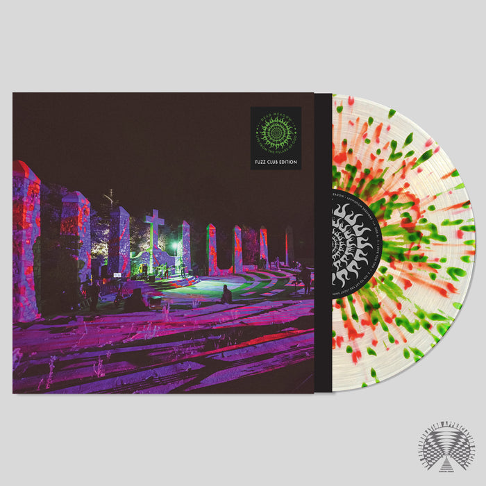 The Dead Meadow - Levitation Session (Fuzz Club Edition) vinyl features red and green splatters on clear, shown partly out of a vibrant cemetery-scene cover—a must-have for any psychedelic rock or Dead Meadow fan.