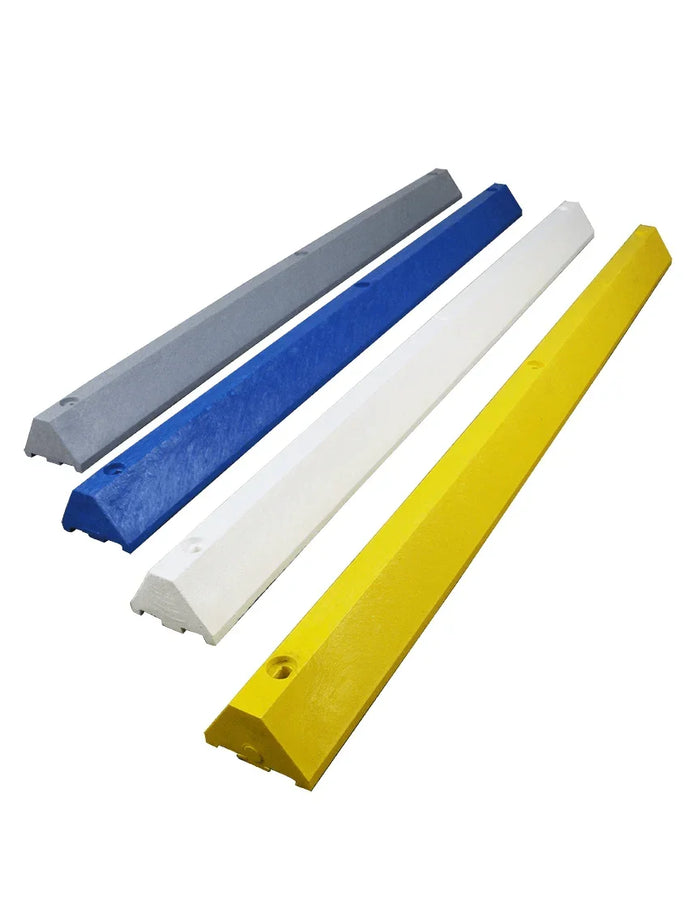 Set of four industrial plastic parking blocks in gray, blue, white, and yellow