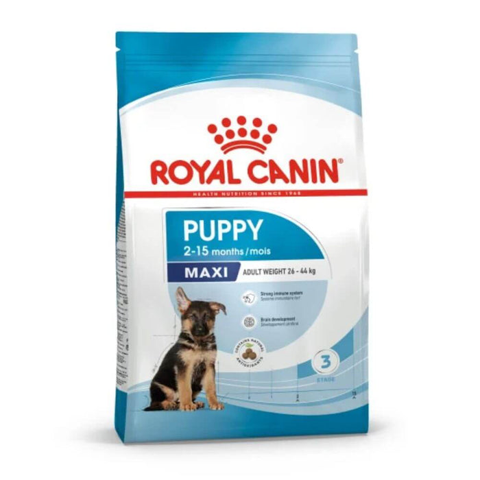 A bag of Royal Canin Puppy Maxi dog food, designed for puppies aged 2-15 months. The packaging is white and blue with a red Royal Canin logo and a photo of a German Shepherd puppy on the front.