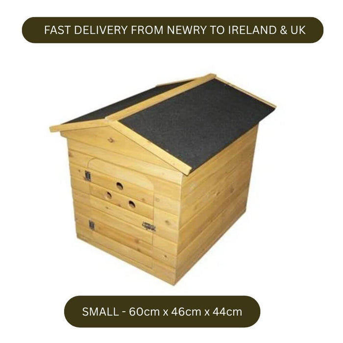 A small wooden dog kennel with a slanted dark gray roof, shown on a white background with text banners reading 'FAST DELIVERY FROM NEWRY TO IRELAND & UK' and 'SMALL - 60cm x 46cm x 44cm'.