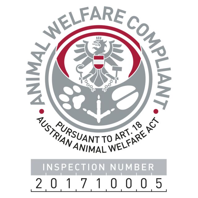 Animal welfare compliance logo with inspection number on a white background