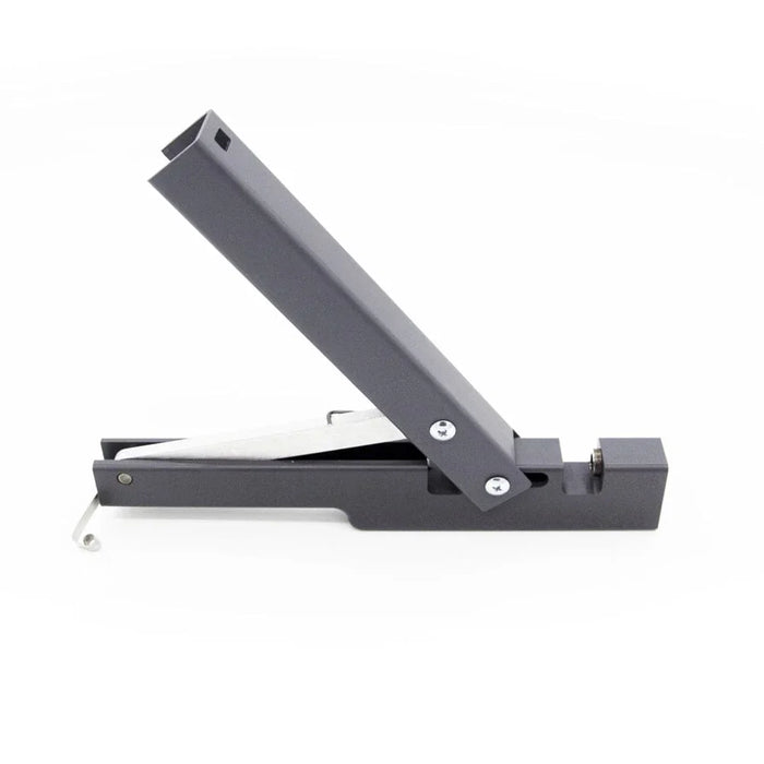 Metal water injector tubing punch tool with ergonomic handle on white background